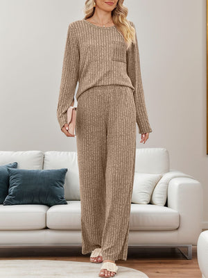 Ribbed knit lounge set in camel with long sleeves, crew neck, chest pocket, and wide-leg pants.