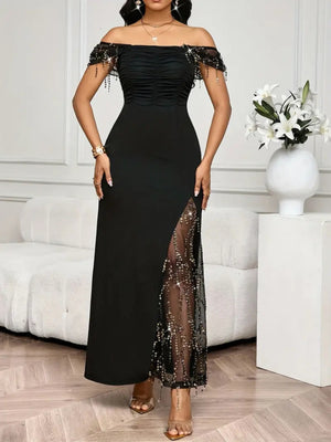 Black sequin mesh maxi dress with off-the-shoulder neckline, ruched bodice, and high slit.