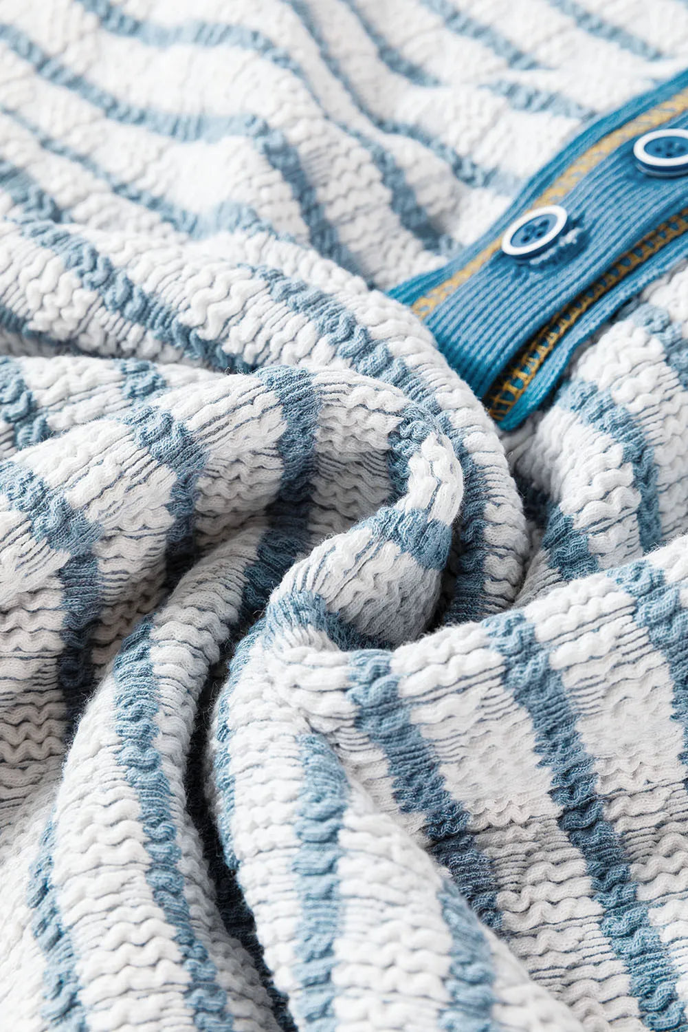 Textured stripe henley sweater in dusty blue with white and blue stripes and button detail