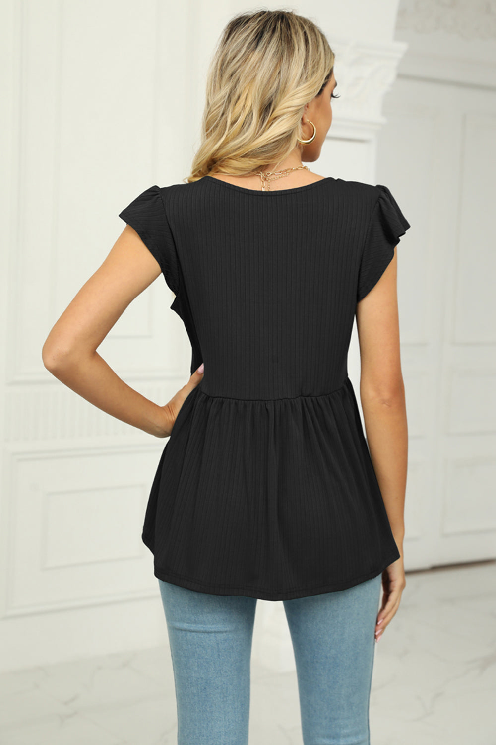Black ribbed flutter sleeve empire top with peplum
