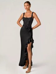 Black sequin ruffle maxi gown with square neckline and thigh-high slit.