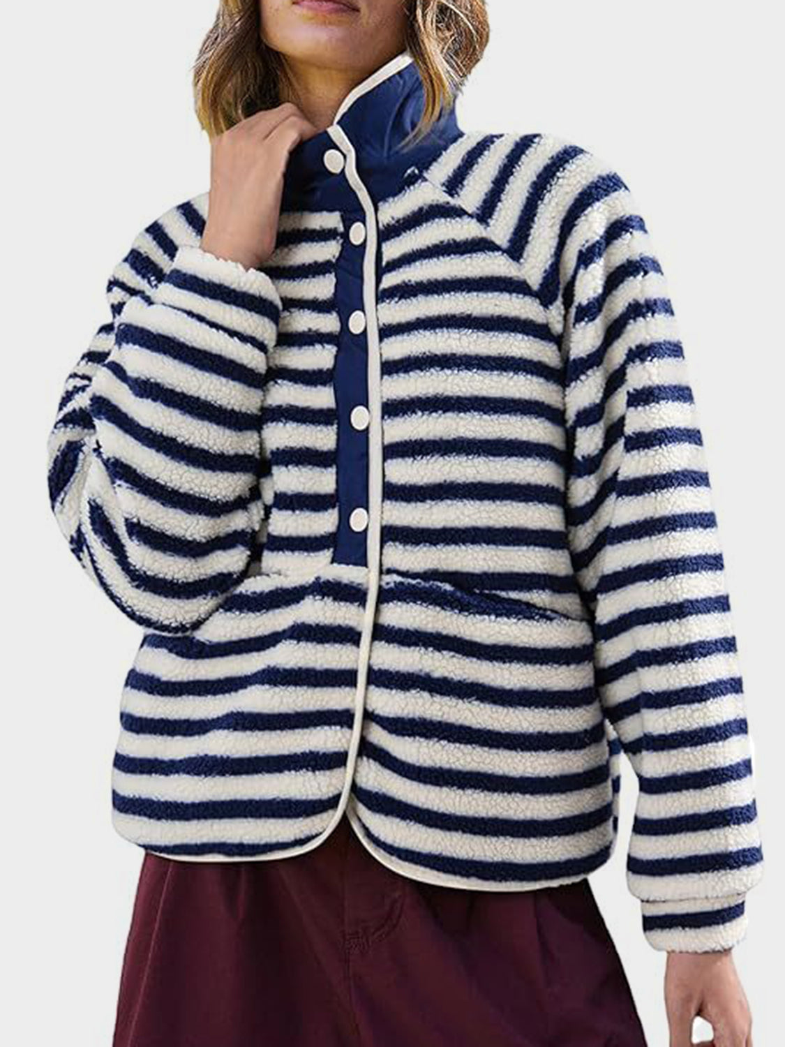 Sherpa button-up jacket with navy and cream stripes, contrast collar and trim.