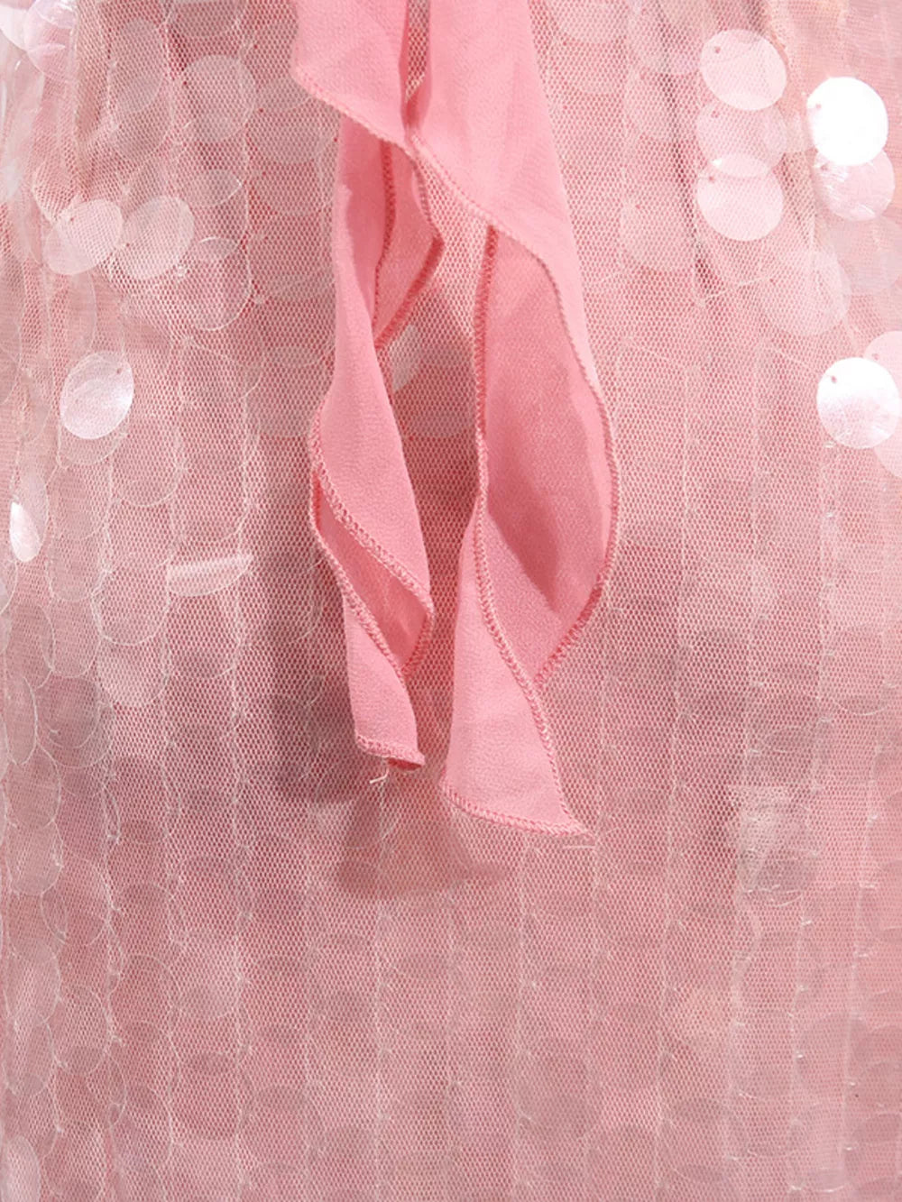 Pink iridescent sequin halter mini dress with ruffled trim detail.