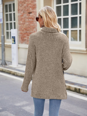 Ribbed turtleneck sweater in Khaki with side slits and long sleeves.