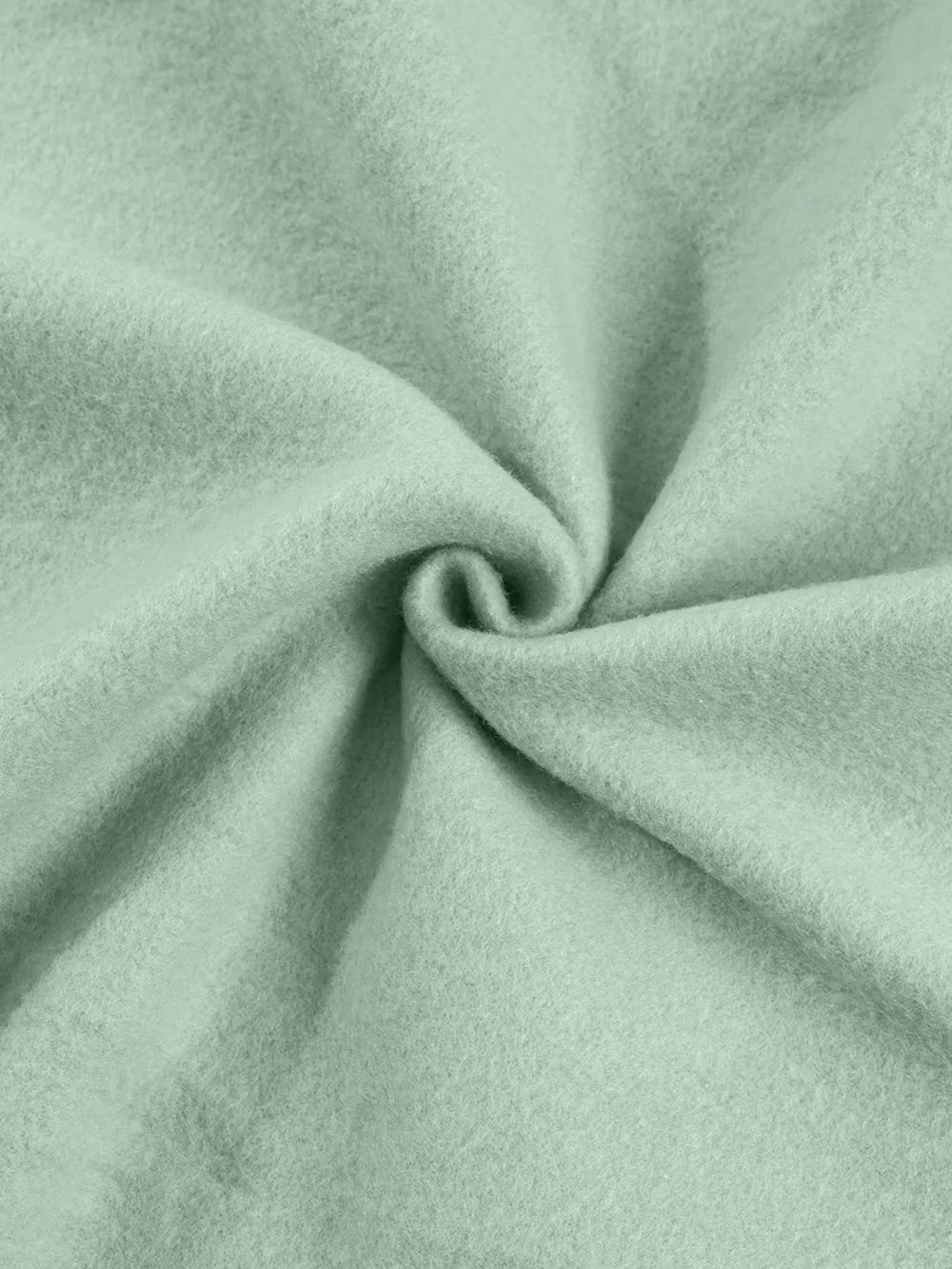 Sage cotton joggers with a soft, textured finish.