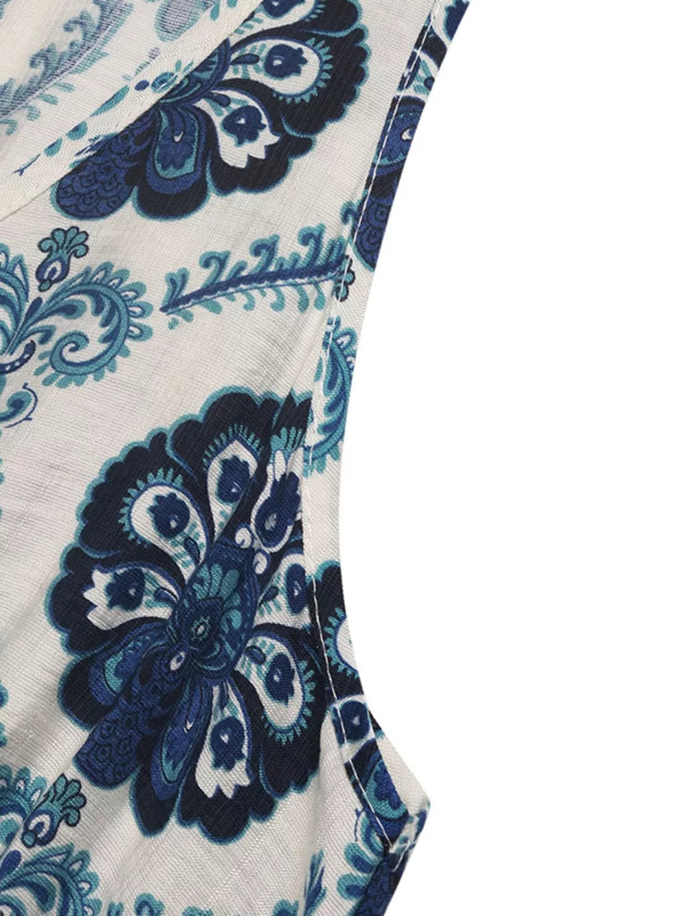 Maxi dress with blue paisley print, V-neck, and sleeveless cut.