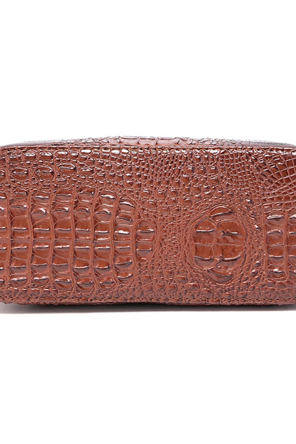 Crocodile embossed satchel bag in mocha with a structured design.