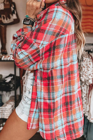 Oversized plaid shacket in orange and deep red with button-down collar.