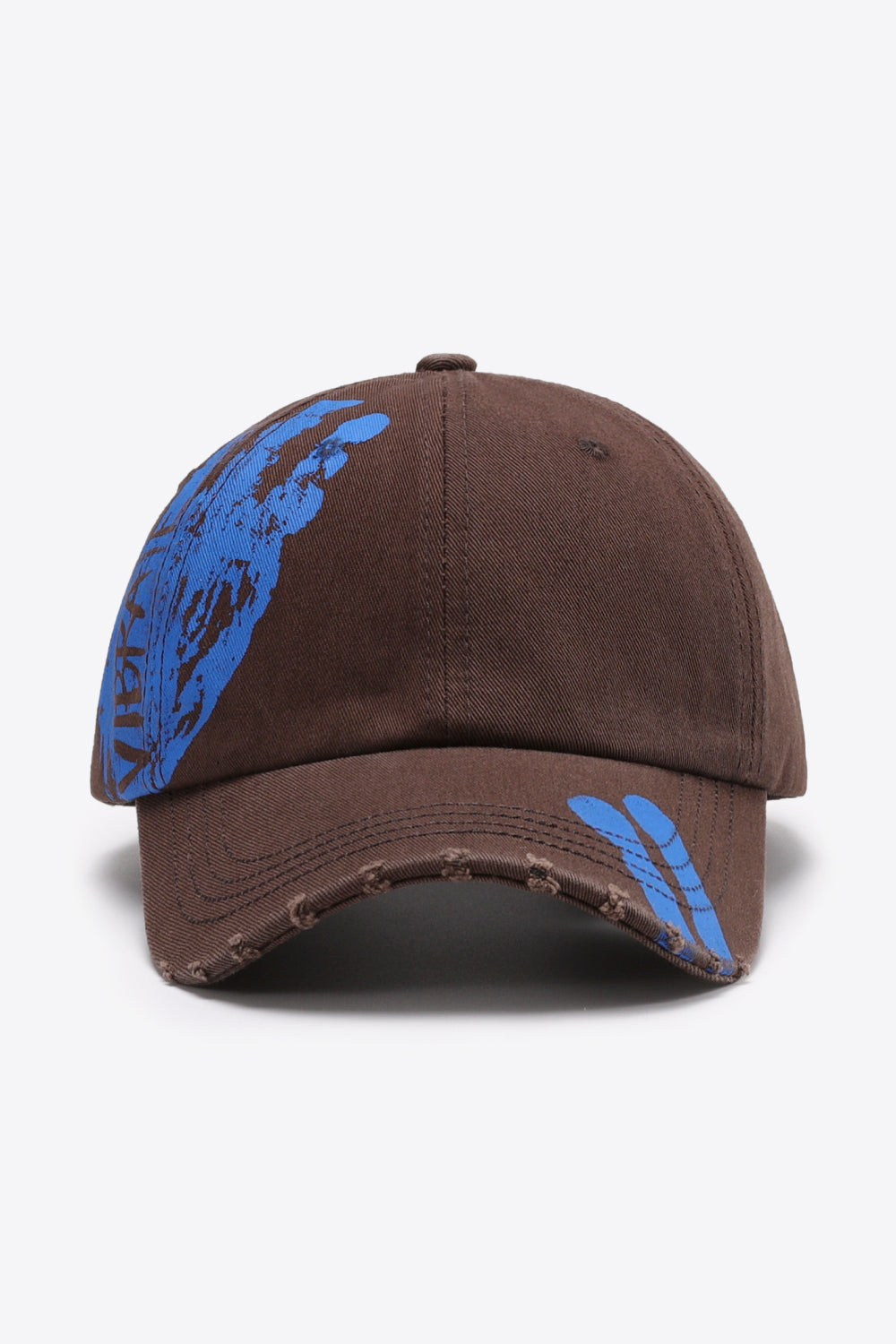 Chestnut baseball cap with distressed brim and blue graffiti art detail.