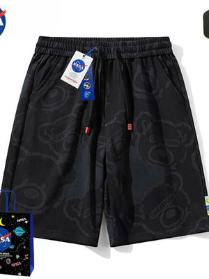 Black men's shorts with all-over playful bear print and drawstring waist.