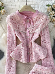 Blush pink lace peplum top with a Peter Pan collar and jewel buttons.