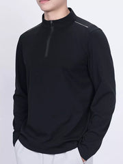 Black long sleeve active t-shirt with quarter zip and reflective shoulder detail.