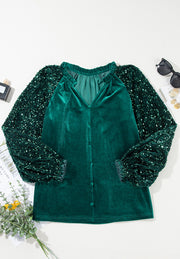 Dark green velvet blouse with sequin sleeves and button front