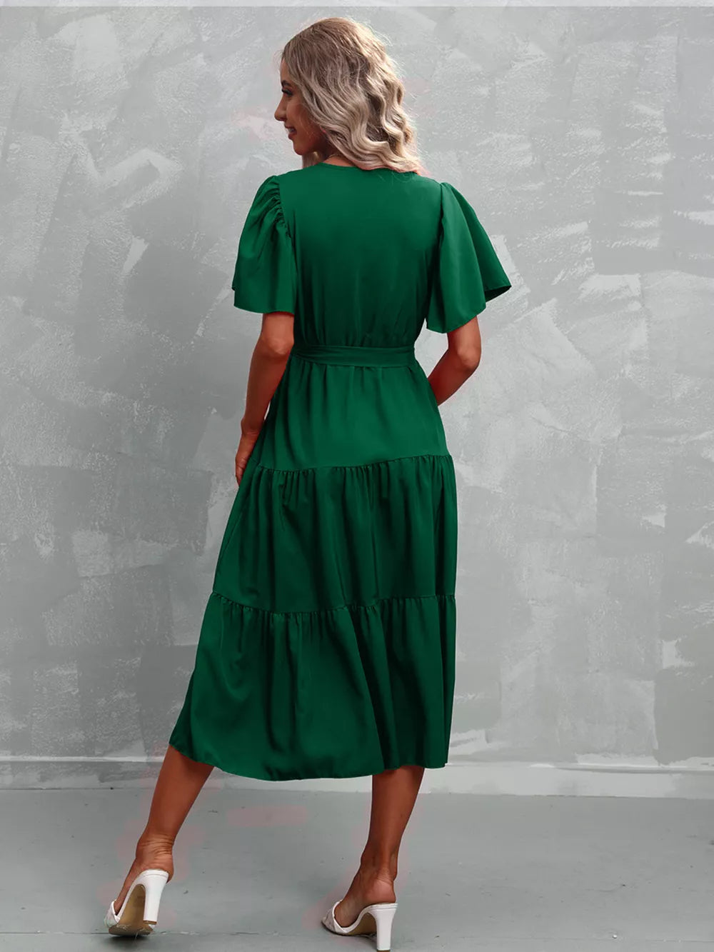 Dark green midi tiered dress with flutter sleeves and belt