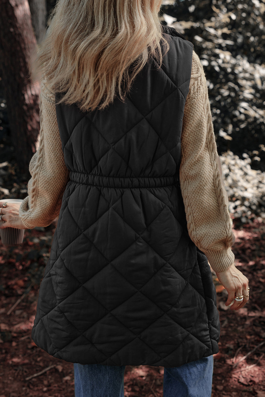 Black diamond quilted longline vest with cinched waist detail
