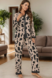 Animal print satin pajama set with buttoned top and pants in leopard.