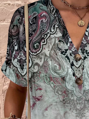 Bohemian tapestry print henley blouse with V-neck and button detail