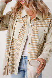 Beige houndstooth corduroy patchwork shacket with button front and chest pockets.