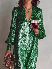Glistening sequin maxi gown in dark green with lantern sleeves and a deep V-neck.