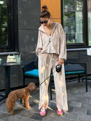 Plush velour lounge set in sand, featuring a zip-up hoodie and wide-leg pants.