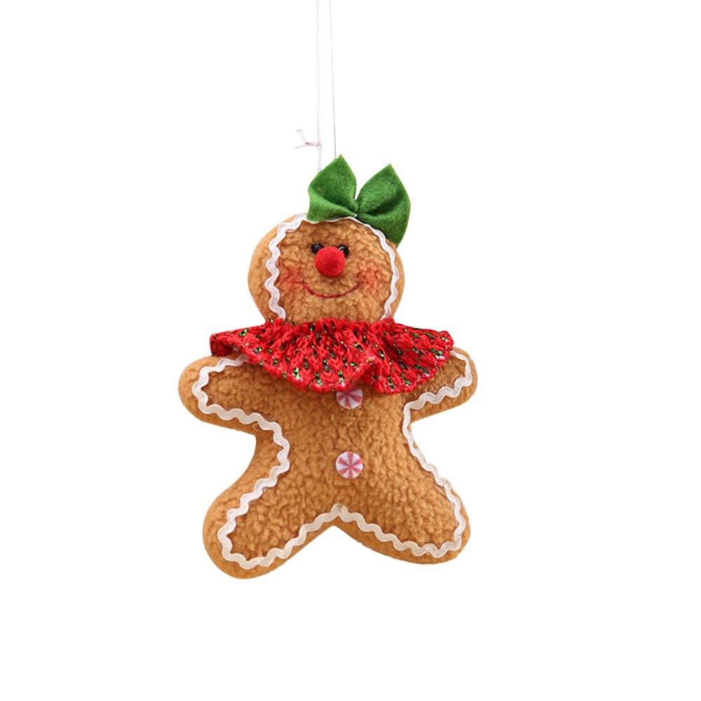 Gingerbread man holiday ornament with red collar and green bow.