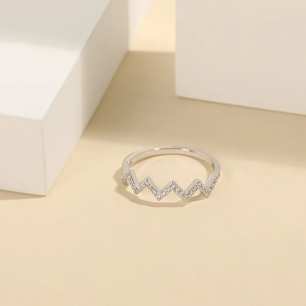 Silver zigzag pavé band ring with clear stones