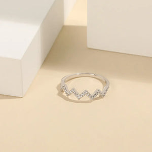 Silver zigzag pavé band ring with clear stones