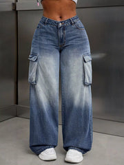 Vintage wide-leg cargo jeans in light wash denim with ombre fading and large side pockets.