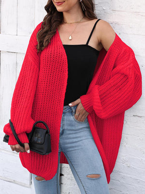 Red open knit cardigan with balloon sleeves and a relaxed fit.