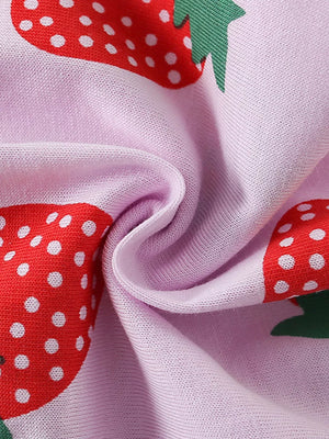 Girls' cotton undershirt with allover red strawberry print on lavender fabric.