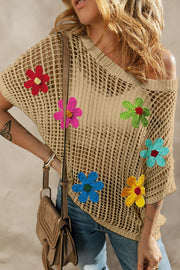 Khaki crochet mesh overlay top with colorful floral appliques and short sleeves.