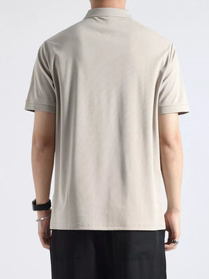 Light gray textured casual polo shirt with button accents and short sleeves.