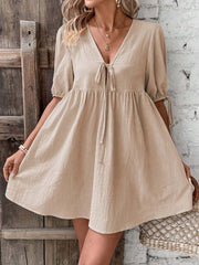 Khaki tie front puff sleeve mini dress with adjustable sleeve ties