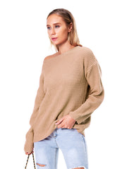 Tan waffle knit off-shoulder sweater with boat neck and long sleeves.