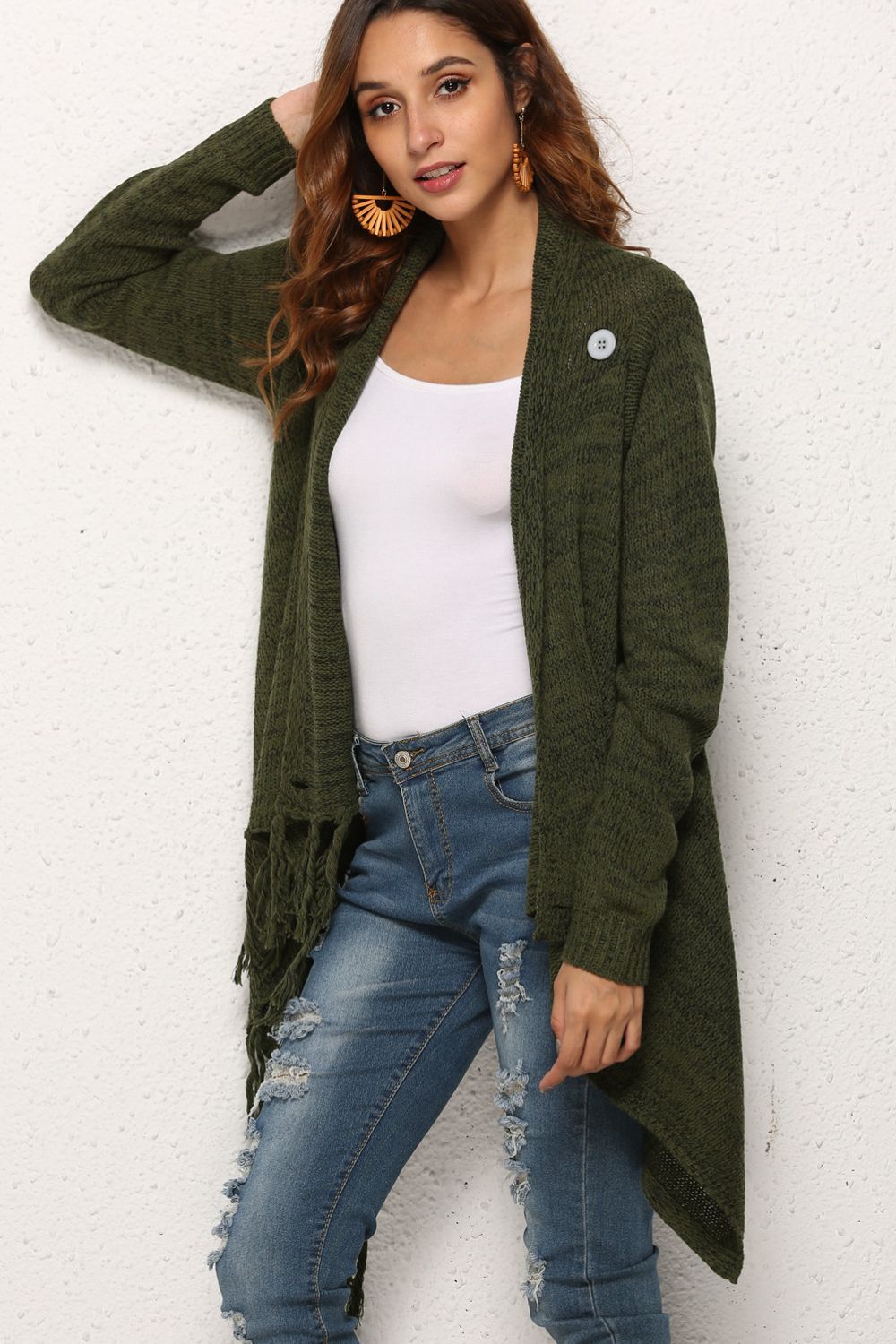 Olive asymmetric fringe knit cardigan with button detail and open front.