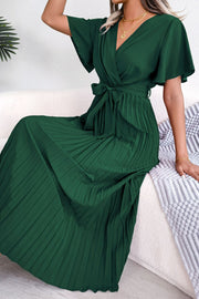 Green wrap bodice midi dress with flutter sleeves and a pleated skirt.