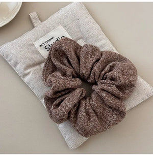 Textured knit scrunchie in Style A brown, a comfortable hair accessory.