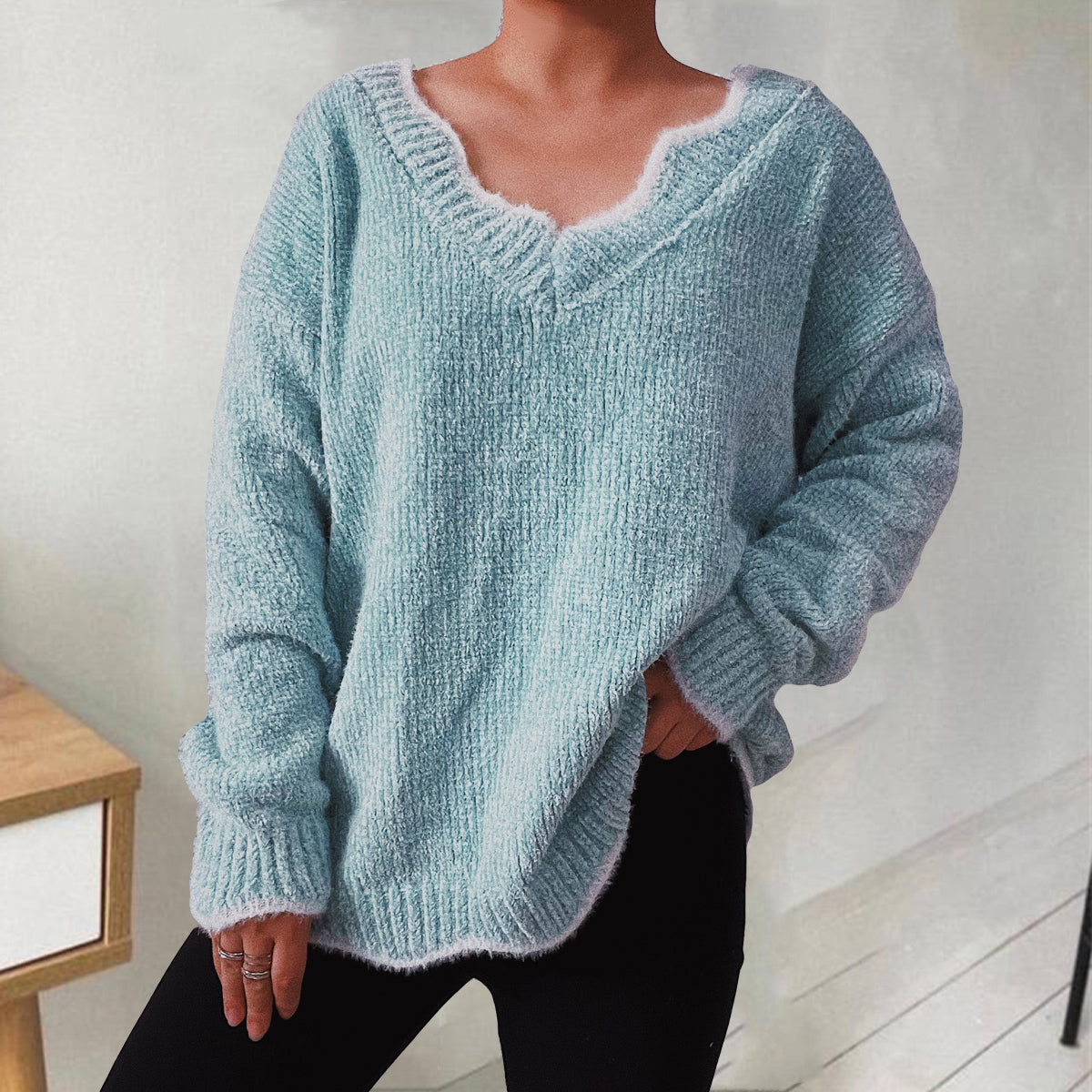 Teal acrylic knit sweater with scalloped trim and V-neck