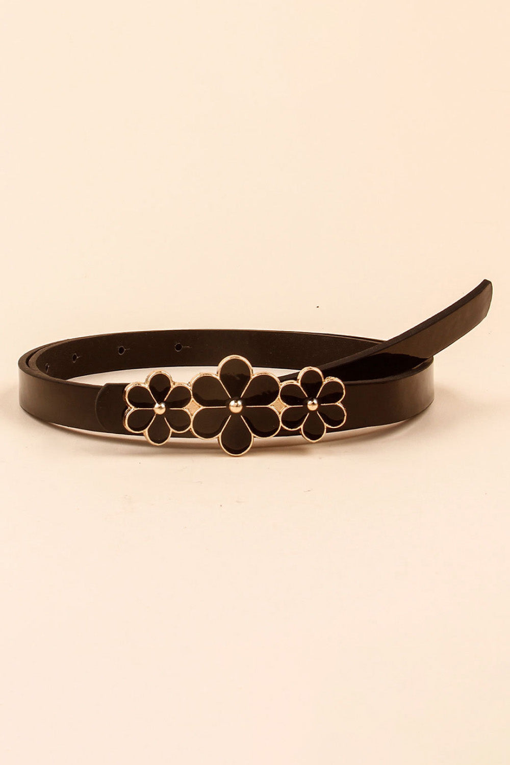 Black skinny belt with gold trim and black floral blossom accents