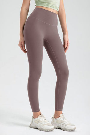Taupe high rise leggings with seamless construction and athletic fit.