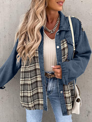 Denim jacket with plaid paneling and button front in light blue.