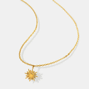 Golden sunburst pendant necklace with adjustable chain, 18K gold-plated.