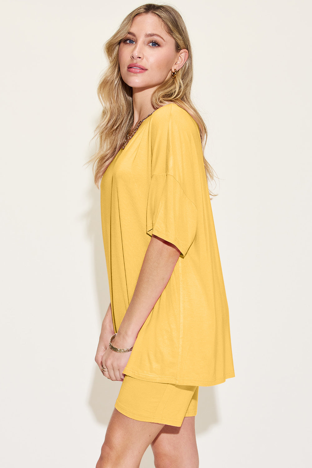 Yellow bamboo loungewear set with relaxed fit tee and shorts.