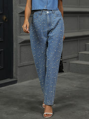 Dusty blue straight leg jeans with allover pearl embellishments.