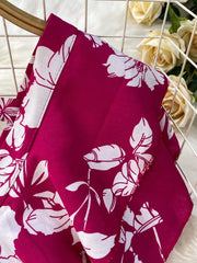 Rose red floral cotton maternity romper cover-up with wide legs and pleated detail.