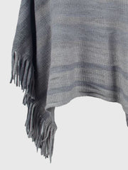 Striped poncho in charcoal with fringe detail and boat neckline