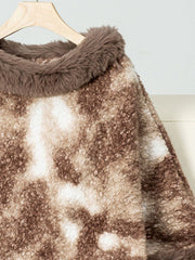 Faux fur trimmed camo poncho in Chocolate with a textured, fuzzy fabric and a soft collar detail.