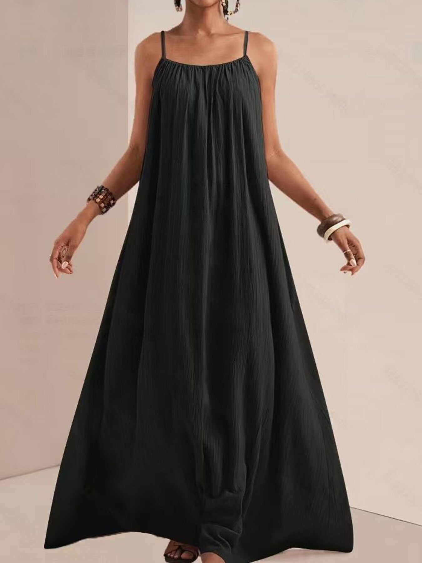 Black maxi swim dress with spaghetti straps and gathered neckline