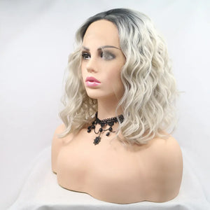 Ombre wave front wig in black and white, bob cut, styled on a mannequin with a black choker.