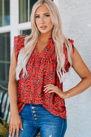 Red floral ruffle sleeve notch-neck blouse with a V-neckline.